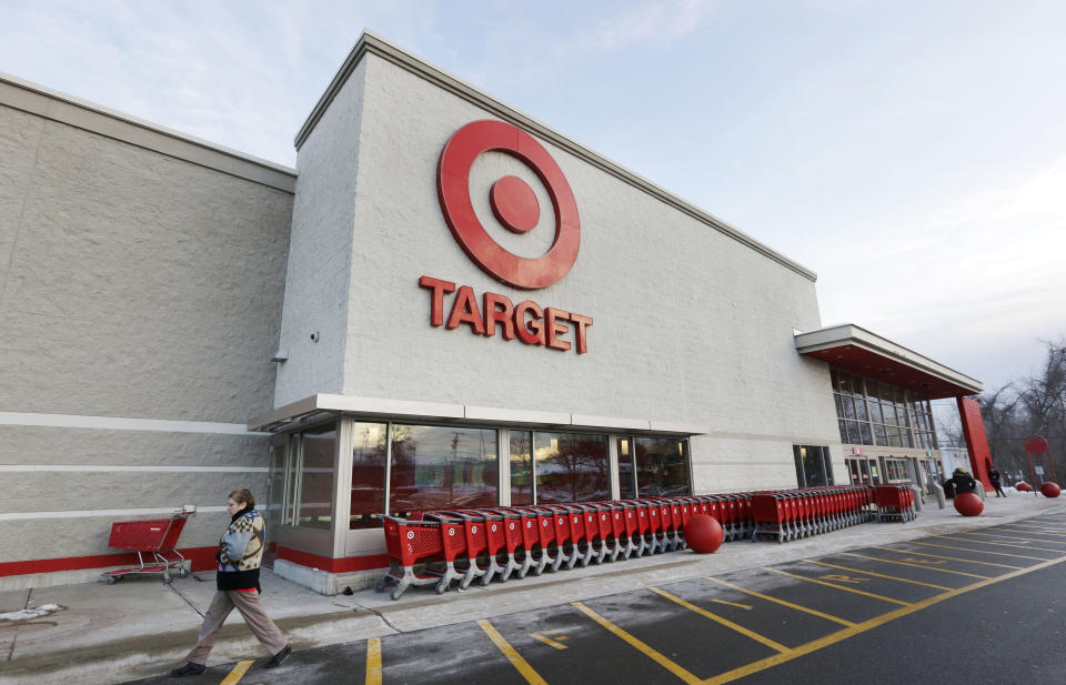 A passer-by walks near an entrance to a Target retail store.