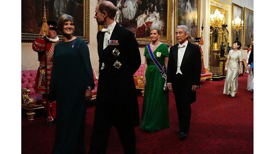 Ms Julia Longbottom (L), Prince Edward, Duke of Edinburgh, Sophie, Duchess of Edinburgh and H.E. Mr. Hirofumi Nakasone (R) make their way along the East Gallery 