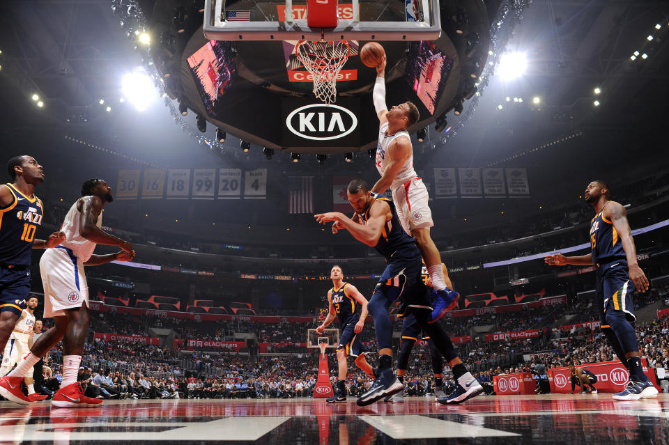 Blake Griffin drops something memorable on the head and body of Rudy Gobert. (Andrew D. Bernstein/NBAE/Getty Images)