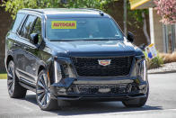 <p>The new Escalade was spotted completely devoid of camouflage gear for the first time recently. The new front end has a sleeker design with narrower lights leading to the edge of the bonnet. The black plastic trim around the grille is like that of an electric Escalade IQ. The largest changes appear to be in the interior. It has digital screens spanning the width of the dash with very little in the way of dials. Expect an autumn 2024 launch. </p>