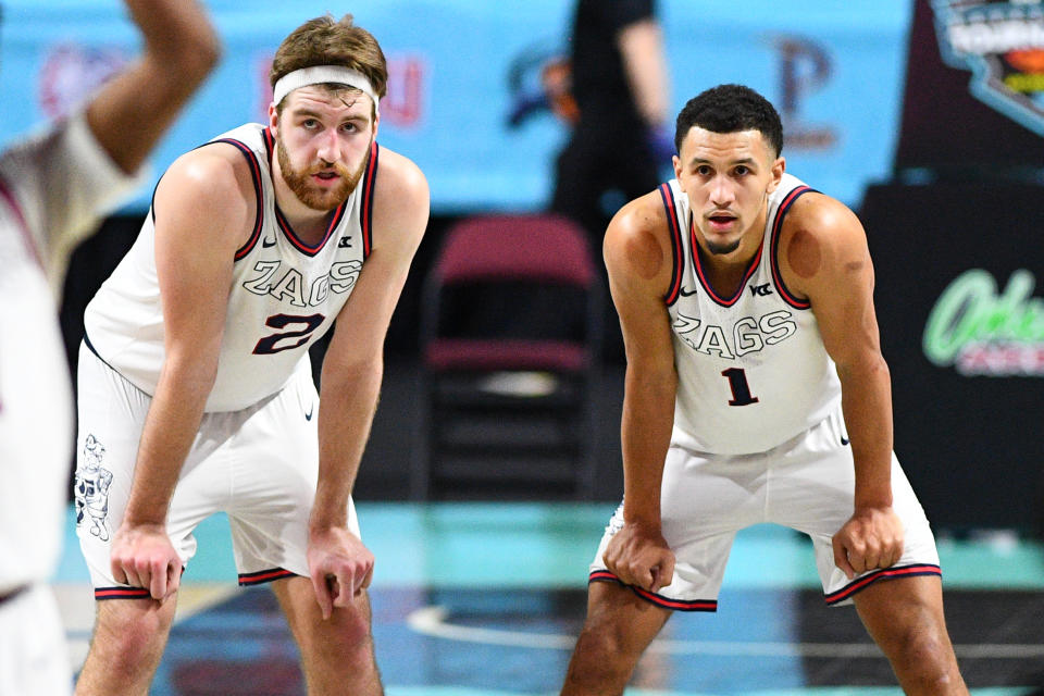 Gonzaga forward Drew Timme (2) and guard Jalen Suggs (1) lead the tournament favorites. (Photo by Brian Rothmuller/Icon Sportswire via Getty Images)