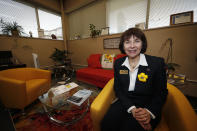 In this Tuesday, Jan. 21, 2020, photograph, Theresa Szczurek is shown in her office where she toils as the executive director of the Colorado Office of Information Technology in downtown Denver. (AP Photo/David Zalubowski)