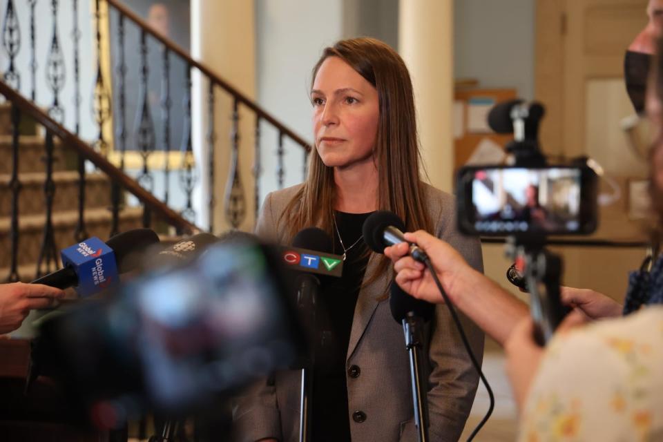 Nova Scotia Education Minister Becky Druhan speaks to reporters at Province House.