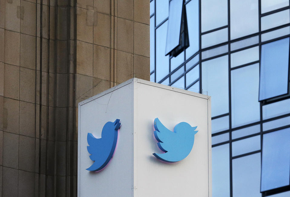 FILE - This Oct. 26, 2016 file photo shows a Twitter sign outside of the company's headquarters in San Francisco. Some political die-hards are getting caught up in an expanded effort by Twitter and other social media companies to crack down on nefarious tactics suspected of interfering in the 2016 election. They have been flagged as "bots," or robot-like automated accounts, because they tweet prolifically. (AP Photo/Jeff Chiu, File)