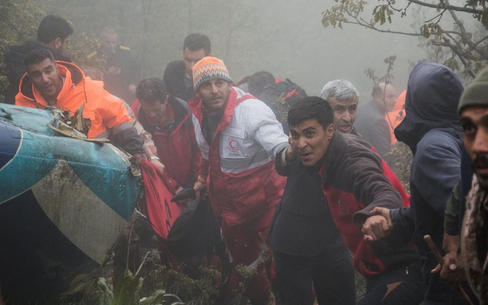 Rescue team works following a crash of a helicopter carrying Iran's President Ebrahim Raisi, in Varzaqan, East Azerbaijan Province, Iran, May 20, 2024