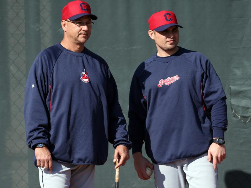 In this Feb. 12, 2013, file photo, Cleveland Indians manager Terry Francona, left, and bullpen coach Kevin Cash watch during spring training baseball in Goodyear, Ariz. Cash was hired as the new manager of the Tampa Bay Rays on Dec. 5, 2014.