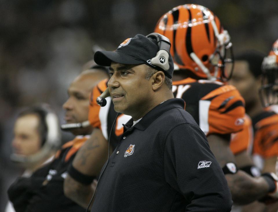 Cincinnati Bengals Marvin Lewis keeps an eye on his team in the first half of their NFL football game with the New Orleans Saints in New Orleans, Sunday, Nov. 19, 2006. The Bengals won 31-16.