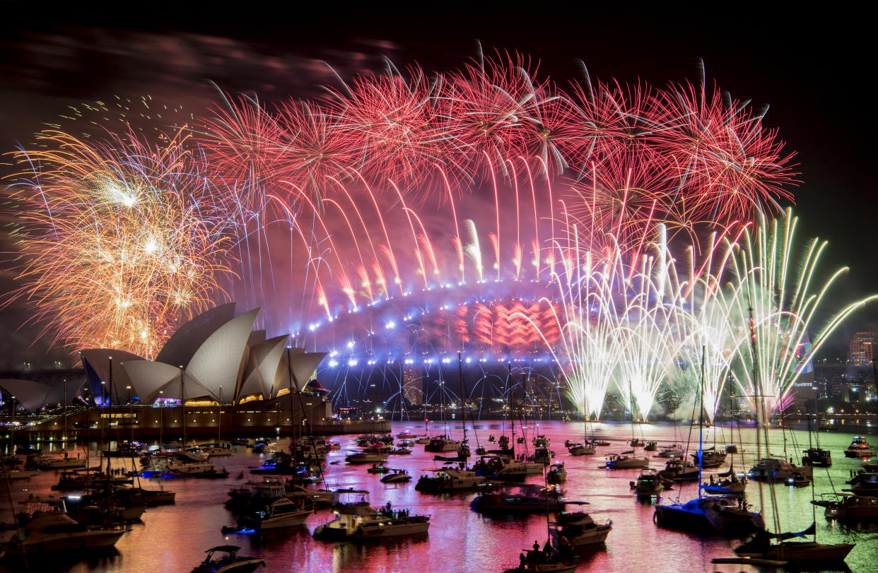 Fireworks explode over the Sydney Harbour during New Year’s Eve celebrations in Sydney, Tuesday, Jan. 1, 2019. (Brendan Esposito/AAP via AP)