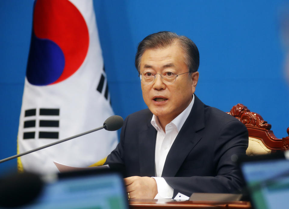 South Korean President Moon Jae-in speaks during an emergency cabinet meeting at the presidential Blue House in Seoul, South Korea, Friday, Aug. 2, 2019. Moon has vowed stern countermeasures against Japan's decision to downgrade its trade status, which he described as a deliberate attempt to contain South Korea's economic growth and a "selfish" act that would damage global supply chains.(Bae Jae-man/Yonhap via AP)