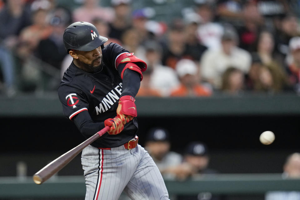 Minnesota Twins' Byron Buxton hits an RBI triple against the Baltimore Orioles during the fourth inning of a baseball game Tuesday, April 16, 2024, in Baltimore. (AP Photo/Jess Rapfogel)