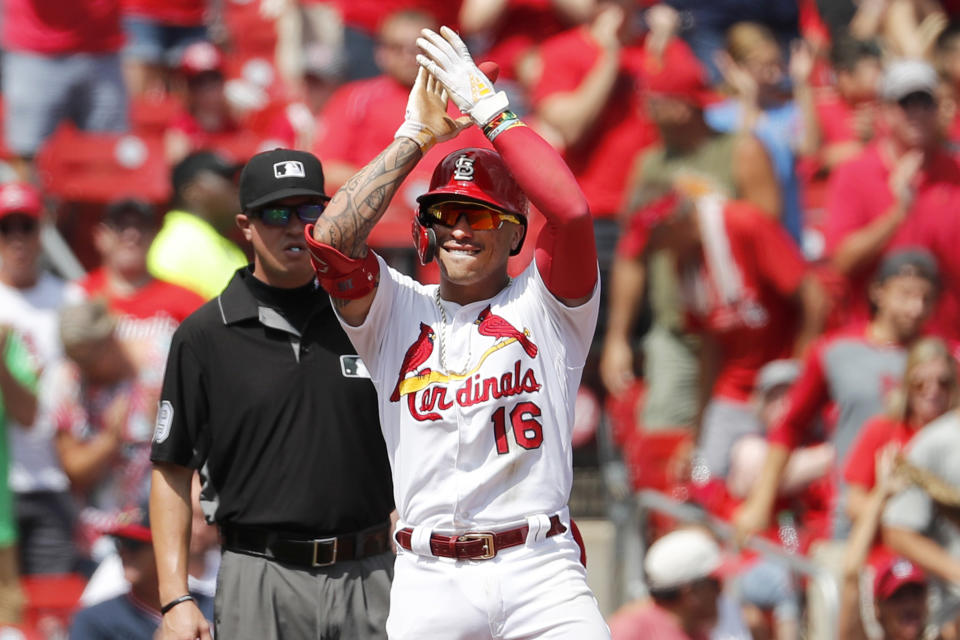 St. Louis Cardinals' Kolten Wong (16) celebrates after hitting an RBI-triple during the first inning of a baseball game against the San Francisco Giants, Monday, Sept. 2, 2019, in St. Louis. (AP Photo/Jeff Roberson)