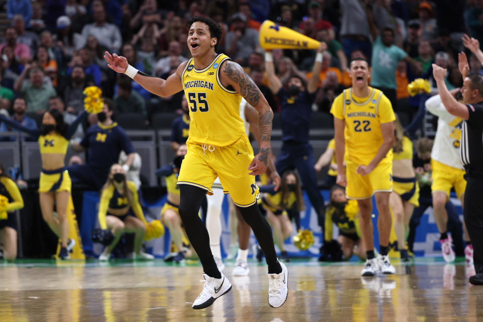 INDIANAPOLIS, INDIANA - MARCH 17: Eli Brooks #55 of the Michigan Wolverines reacts after a three pointer against the Colorado State Rams during the second half in the first round game of the 2022 NCAA Men's Basketball Tournament at Gainbridge Fieldhouse on March 17, 2022 in Indianapolis, Indiana. (Photo by Dylan Buell/Getty Images)