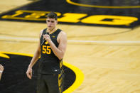 Iowa center Luka Garza speaks folllowing a video tribute after an NCAA college basketball game against Wisconsin, Sunday, March 7, 2021, in Iowa City, Iowa. Garza, a senior, was playing his last home game at Iowa. Iowa won 77-73. (AP Photo/Charlie Neibergall)