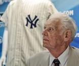 FILE - In this June 28, 2012, file photo, New York Yankees great Don Larsen reacts during a news conference announcing the auction of his 1956 perfect game uniform, in New York. Larsen, the journeyman pitcher who reached the heights of baseball glory in 1956 for the New York Yankees when he threw a perfect game and only no-hitter in World Series history, died Wednesday, Jan. 1, 2020. He was 90. (AP Photo/Bebeto Matthews, File)