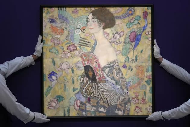 Gustav Klimt’s ‘Dame mit Faecher’ (Lady with a Fan) is displayed at Sotheby’s auction rooms in London on June 20.