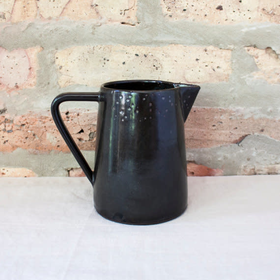 <a href="https://www.etsy.com/listing/464504319/matte-black-ceramic-water-jug-by-barombi?ga_order=most_relevant&amp;ga_search_type=all&amp;ga_view_type=gallery&amp;ga_search_query=matte%20black&amp;ref=sr_gallery_45" target="_blank">Get it here</a>.