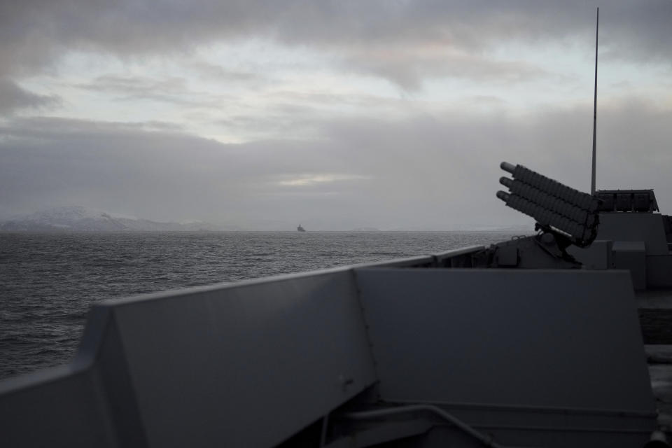 A vessel from the NATO force sails off the French navy frigate Normandie during a patrol in a Norwegian fjord, north of the Arctic circle, Thursday March 7, 2024. The French frigate is part of a NATO force conducting exercises in the seas, north of Norway, codenamed Steadfast Defender, which are the largest conducted by the 31 nation military alliance since the cold war. (AP Photo/Thibault Camus)