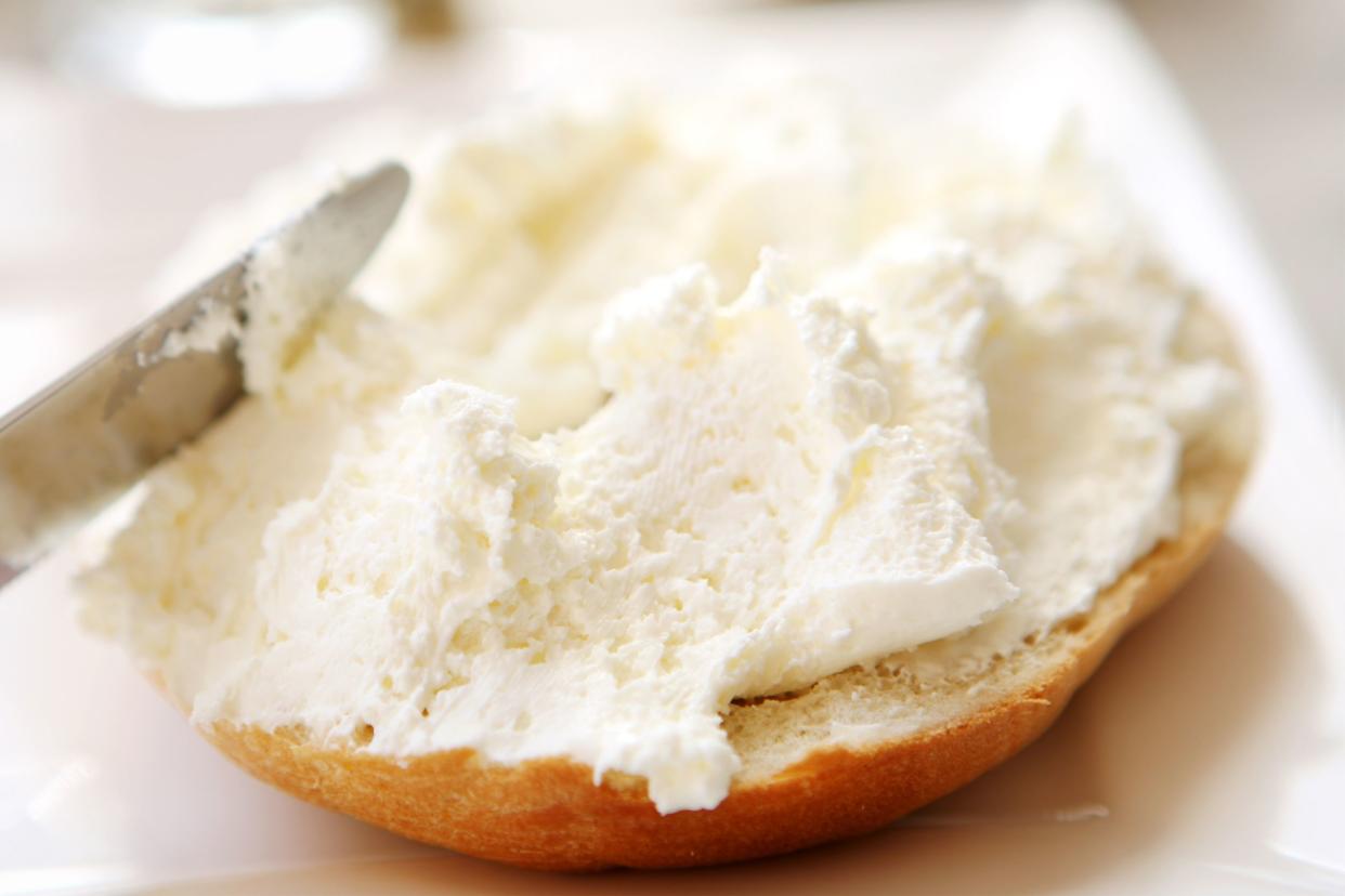 Cream Cheese on half of a bagel