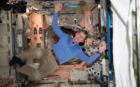 American astronaut Peggy Whitson celebrates after smashing the record for the most cumulative time in space - Credit: ZUMA Press / MEGA/ZUMA Press / MEGA