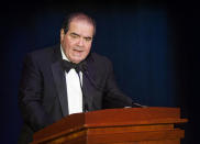 FILE - In this Nov. 6, 2014, file photo Supreme Court Justice Antonin Scalia speaks in Washington. President Donald Trump has visions of establishing by the final months of his second term—should he win one—a “National Garden of American Heroes” that will pay tribute to some of the prominent figures in the nation’s history, including Justice Scalia, that he sees as the “greatest Americans to ever live.” The president unveiled his plan Friday, July 3, 2020, during his speech at Mount Rushmore National Memorial, S.D. (AP Photo/Kevin Wolf, File)