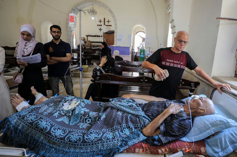 Gaza's Baptist Church turned into a clinic as patients and the wounded crowd hospitals