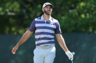 Jun 16, 2018; Southampton, NY, USA; Dustin Johnson reacts on the second tee box during the third round of the U.S. Open golf tournament at Shinnecock Hills GC - Shinnecock Hills Golf C. Mandatory Credit: Brad Penner-USA TODAY Sports