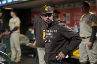 San Diego Padres manager Jayce Tingler stands in the dugout during the eighth inning of his team's baseball game against the San Francisco Giants in San Francisco, Friday, Oct. 1, 2021. (AP Photo/Jeff Chiu)