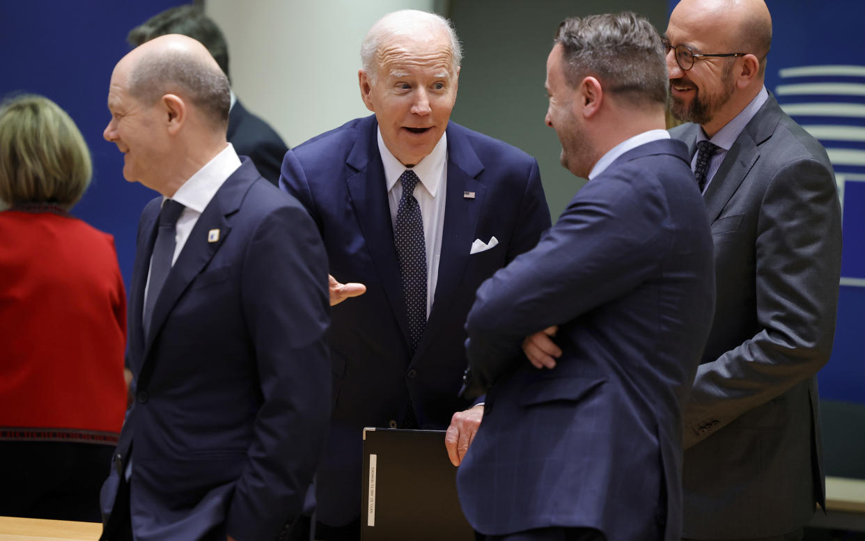 President Biden, center, speaks with from left, German Chancellor Olaf Scholz, Luxembourg's Prime Minister Xavier Bettel and European Council President Charles Michel during a round table meeting at an E.U. summit in Brussels, Thursday, March 24, 2022. (AP Photo/Olivier Matthys)