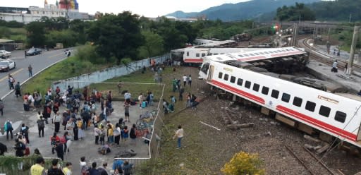 All eight carriages on the Puyuma Express train in Taiwan were derailed and five flipped onto their side in the accident