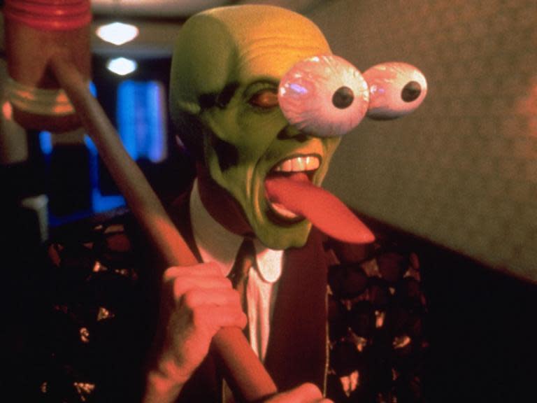 Today marks 25 years since the release of The Mask, the second of three career-making comedies released in 1994, along with Dumb and Dumber and Ace Ventura: Pet Detective, that turned Jim Carrey into a comedy sensation.It was also a pioneering special effects showcase, home of a number of memorable catchphrases (“Sssssssmokin’!” undeniably the “Yeah, baby, yeah!” of the early 1990s), and introduced a smouldering Cameron Diaz to a generation of gaga adolescents.But for the critical class of 1994, The Mask was also something of a damp squib – regarded as not particularly funny or enjoyable, and only rescued by Carrey’s then-fresh rubber-faced schtick. And with the film now largely regarded as something of a cult classic, and certainly one of the most daringly weird comic book adaptations of the last 30 years, it’s interesting to take a look back at the first responses to the film upon its release. Here are just a small sample...“[Jim] Carrey returns in The Mask, an astonishingly lazy and perfunctory effort that does little to realise his comic potential… [it] underscores the shrinking importance of conventional storytelling in special effects-minded movies, which are happy to overshadow quaint ideas about plot and character with flashy, up-to-the-minute gimmickry. Far more energy has gone into stretching Mr Carrey’s face, twirling his legs and conceiving animation-style gags for him to exploit than into creating a single interesting character or memorable line.” Janet Maslin, New York Times“Lean, mean and green, The Mask is unquestionably a money-making movie machine. But there’s nothing mechanical or rote about the offbeat romantic adventure. This showcase for the talents of Jim Carrey is adroitly directed, viscerally and visually dynamic and just plain fun. The box office will be booming just like the title character’s heart, and the film should easily emerge as one of the year’s biggest commercial successes.” Leonard Klady, Variety“The Mask taps Jim Carrey’s antic energy and Play-Doh pliability, fortifies these with animated alchemy and, alakazam, the star is transformed into Gumby on paint fumes. Effectively, the comic actor becomes one with a Tex Avery-type ‘toon in a series of sequences that are literally jaw-dropping. But these loopy-doopy interludes aside, there’s little else to recommend this slight comic variation on Dr Jekyll and Mr. Hyde.” Rita Kempley, Washington Post“Crowds won’t flock to The Mask for subtlety. They want to see Carrey play monkey boy and go bananas. That he does, especially in a free-for-all climax that pulls out all the stops in head-spinning hilarity. Even when the gags are laboured, Carrey stays light on his feet. This gifted clown has found the right vehicle for his souped-up silliness. Carrey is the ultimate party dude, and like the masked man says, this party is smokin’.” Peter Travers, Rolling Stone“Not only is he adept at physical humour, the kind of knockabout stuff that recalls the classic silent clowns, but Carrey also has a bright and likeable screen presence, a lost puppy quality that is surprisingly endearing.” Kenneth Turan, Los Angeles Times“Cameron Diaz is a true discovery in the film, a genuine sex bomb with a gorgeous face, a wonderful smile, and a gift of comic timing. This is her first movie role, after a brief modelling career. It will not be her last. Her chemistry with the Carrey character holds together a plot that is every bit as derivative as it can be, and when she dances with the Mask the result is one of those scenes when movie magic really works.” Roger Ebert, Chicago Sun-TimesWith Diaz propelled to superstar status as a result of the film, and becoming one of the most bankable and highest-paid actors by the turn of the 21st century, it is Ebert’s review that proved to be the most prescient of all.
