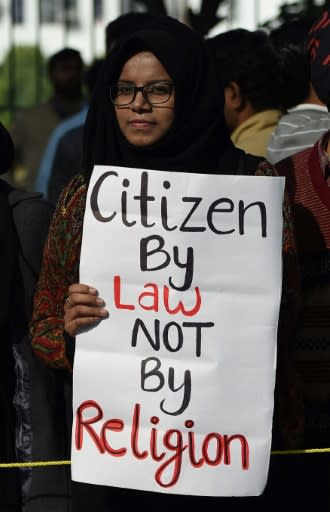 A crowd of mostly young people rallied outside Delhi's Jamia Millia Islamia university to protest the law