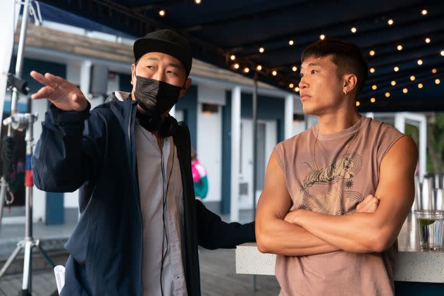 Director Andrew Ahn and writer and star Joel Kim Booster on the set of 