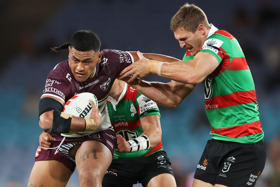 SYDNEY, AUSTRALIA - MARCH 25:  Haumole Olakau'atu of the Sea Eagles is tackled during the round four NRL match between South Sydney Rabbitohs and Manly Sea Eagles at Accor Stadium on March 25, 2023 in Sydney, Australia. (Photo by Mark Metcalfe/Getty Images)