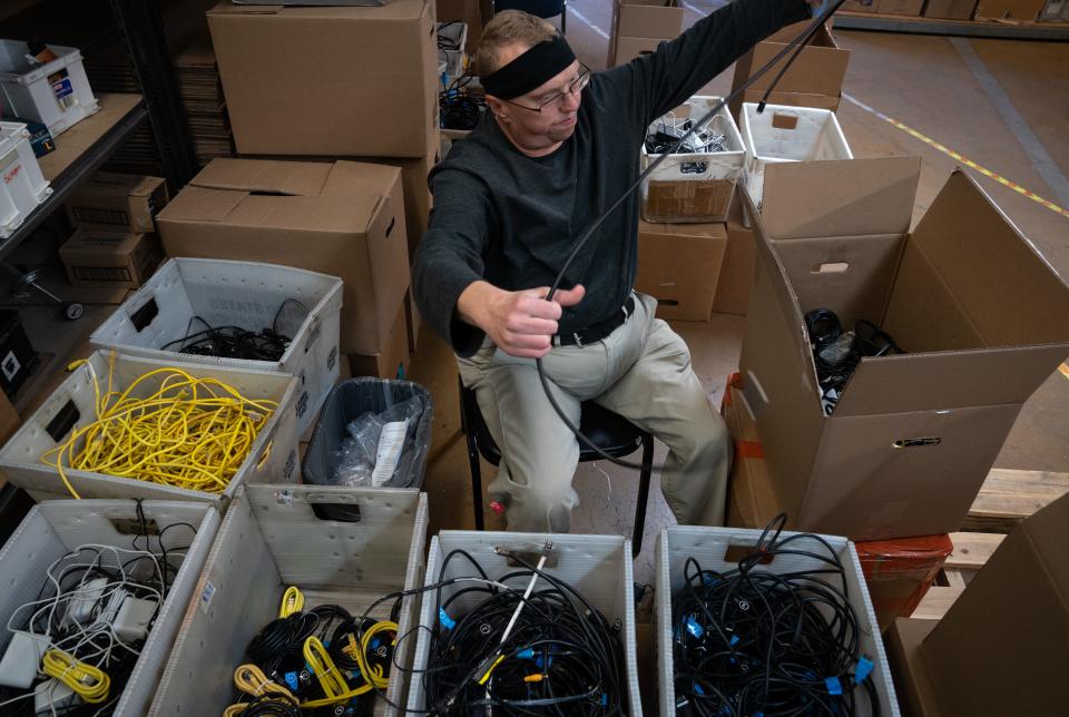 Jeff Terrill sorts cords on Jan. 9, 2024, at STARS in Scottsdale.