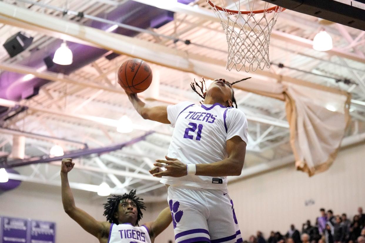 Pickerington Central's Devin Royal (21), dunking in a game vs. Africentric, is the 2023 Ohio Mr. Basketball winner.