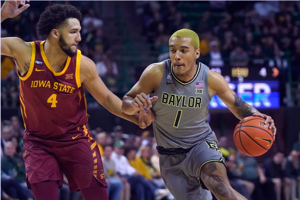 Baylor forward Jeremy Sochan (1) drives against Iowa State forward George Conditt IV (4) during the first half of an NCAA college basketball game in Waco, Texas, Saturday, March 5, 2022. (AP Photo/LM Otero)