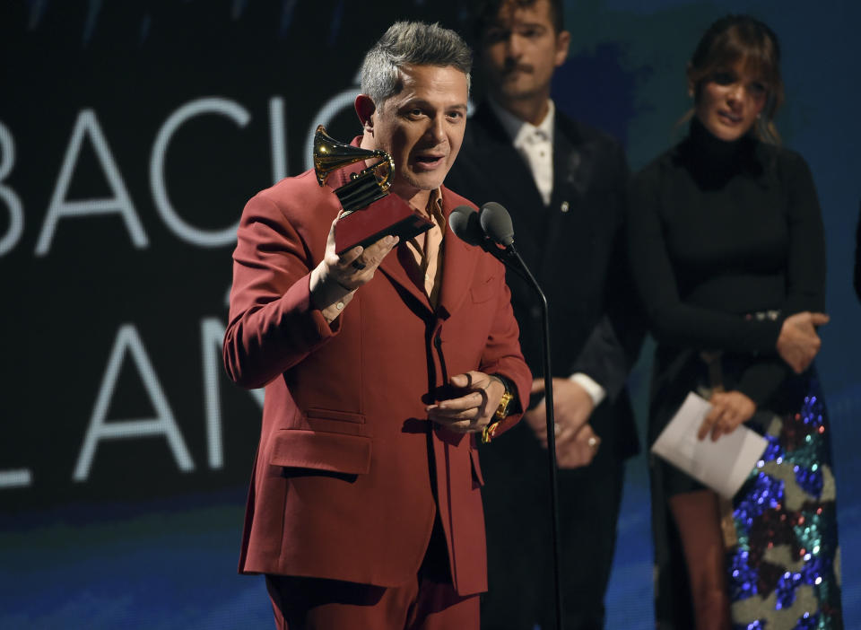 Alejandro Sanz accepts the award for record of the year for "Mi Persona Favorita" at the 20th Latin Grammy Awards on Thursday, Nov. 14, 2019, at the MGM Grand Garden Arena in Las Vegas. (AP Photo/Chris Pizzello)