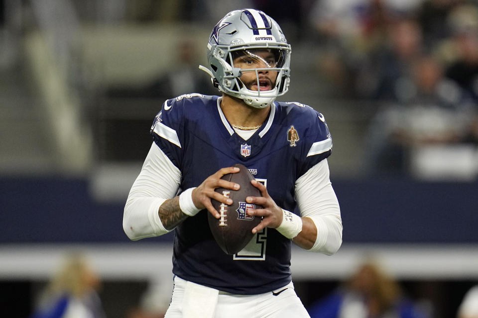 Dallas Cowboys quarterback Dak Prescott prepares to pass during the first half of an NFL football game against the Los Angeles Rams Sunday, Oct. 29, 2023, in Arlington, Texas. (AP Photo/Julio Cortez)