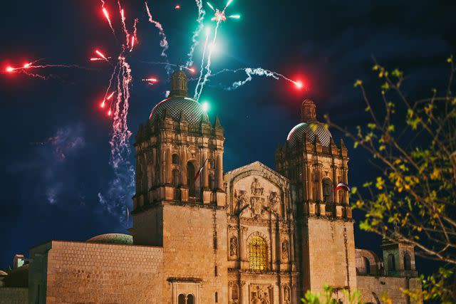 <p>Daniel Seung Lee</p> Fireworks over Templo de Santo Domingo de Guzmán, as seen from Cobarde restaurant, in Oaxaca City.