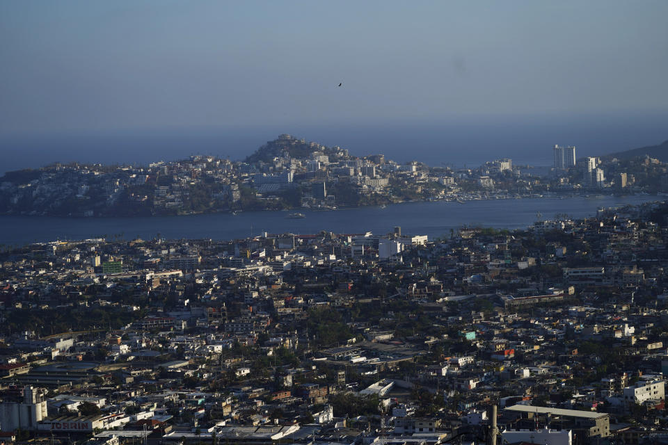 A view of damaged homes in the aftermath of Hurricane Otis, in Alta Cuauhtemoc, in Acapulco, Mexico, Thursday, Nov. 9, 2023. Nearly three weeks after the Category 5 hurricane devastated this Pacific port, leaving at least 48 people dead and the city’s infrastructure in tatters, the cleanup continues. (AP Photo/Marco Ugarte)