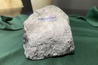 A rock is displayed at Piedmont Lithium's headquarters in Belmont