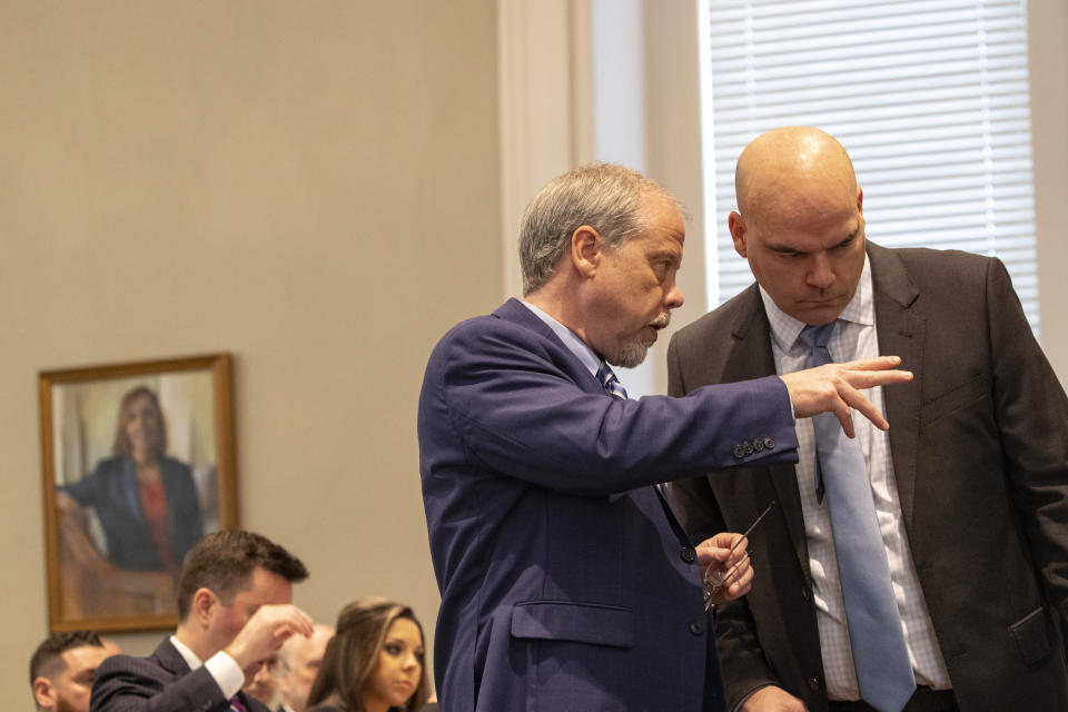 Prosecutor Creighton Waters talks with John Conrad in the double murder trial of Alex Murdaugh at the Colleton County Courthouse in Walterboro, S.C., Wednesday, Feb. 1, 2023. (Andrew J. Whitaker/The Post And Courier via AP, Pool)