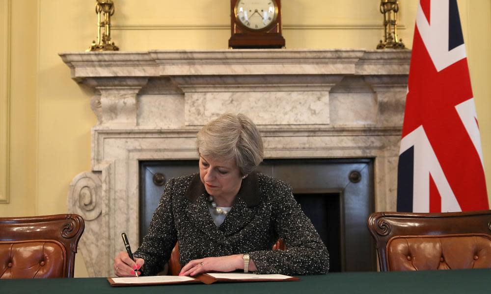 Theresa May signs the official letter to European Council President Donald Tusk invoking article 50 and the UK’s intention to leave the EU.