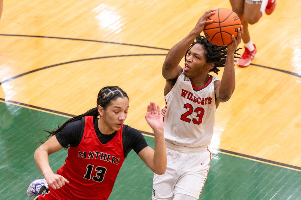 Lawrence North High School junior Azavier Robinson (23) shoots during the second half of an IHSAA Class 4A Boys’ Sectional basketball game, Wednesday, Feb. 28, 2024, at Lawrence North High School.