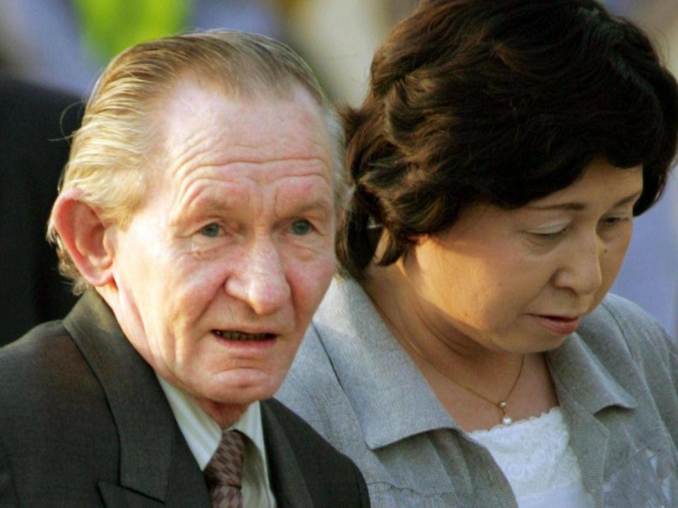 Jenkins with his wife after landing at Tokyo's Haneda airport in 2004, more than 39 years after he defected (REUTERS)