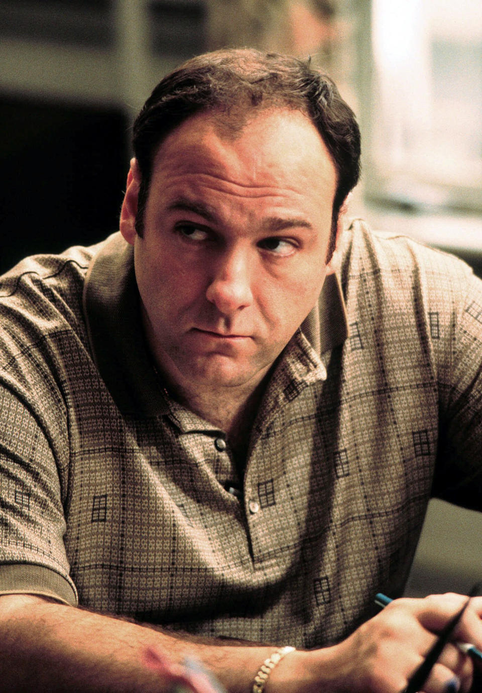 FILE - This 1999 file photo released by HBO shows actor James Gandolfini as Tony Soprano in the critically acclaimed HBO series "The Sopranos." Gandolfini's portrayal of Tony Soprano represented more than just a memorable TV character. He changed the medium, making fellow antiheroes like Walter White and Don Draper possible, and shifted the balance in quality drama away from broadcast television. Gandolfini died Wednesday, June 19, 2013, in Italy. He was 51. (AP Photo/HBO, Anthony Nesta, file)