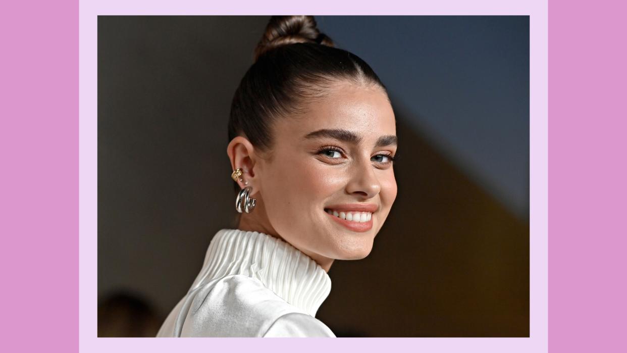  Taylor Hill attends the launch of Cote des Roses' New Campaign, photographed by David LaChapelle and starring Taylor Hill at Milk Studios Los Angeles on April 29, 2022 in Los Angeles, California. Taylor Hill's makeup is glowy, with the model wearing a nude lipstick/ in a purple template 