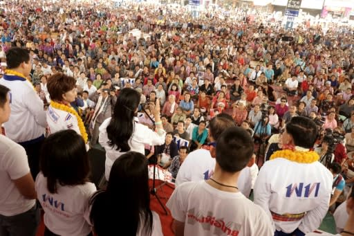 Thousands of Thais loyal to ex-premier Thaksin Shinawatra gather for a political rally in rural Chaiyaphum