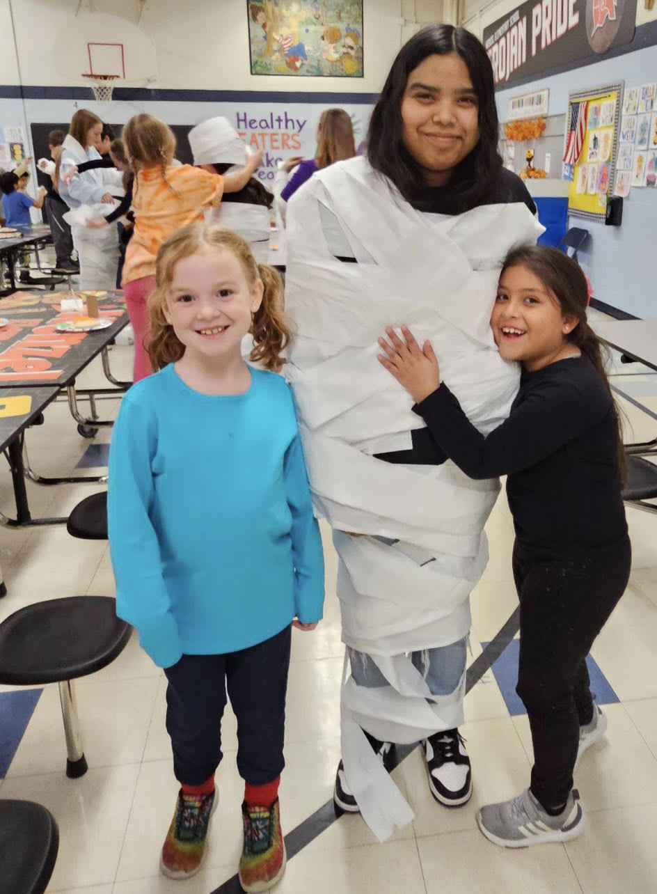 Piper Holdsworth, Anaiz Martinez and Lea Valdez participate in the Big Buddy program at Wenzel Elementary School.