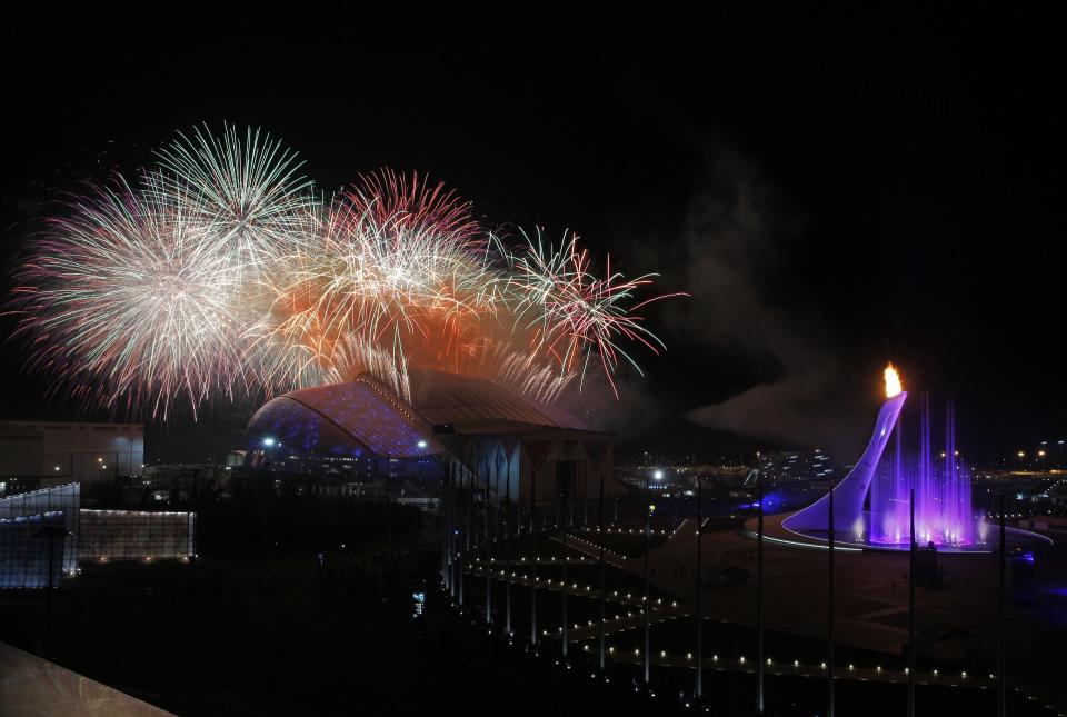 Fireworks are seen over the Olympic Park during the opening ceremony of the 2014 Winter Olympics in Sochi, Russia, Friday, Feb. 7, 2014. (AP Photo/Julio Cortez)